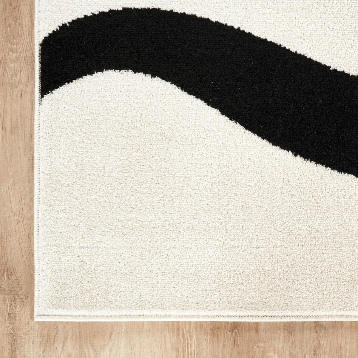 Geometric Black and Cream Area Rug